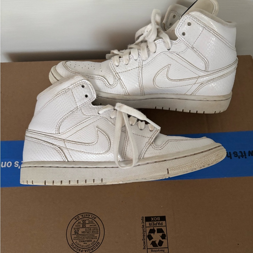 Women’s all white Jordan 1 mid’s